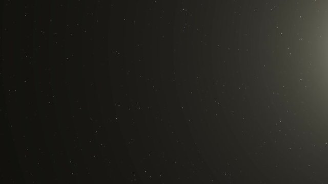 Animated 3D Dust Particles over Black Background with Warm Lens Flare