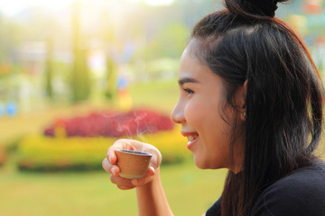 caucasian woman relax with drinking tea at balcony home in morning,girl smiling happiness with hot drink,lady and health drinks