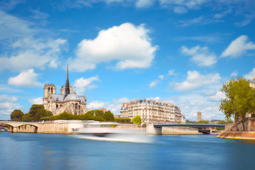 Paris in Spring. Touristic boat on the river next to Ile de la Cite