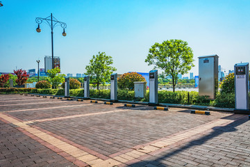 SAN DIEGO, CA - JANUARY 29, 2014: Solar powered electric vehicle car charging station in a public parking lot in California.