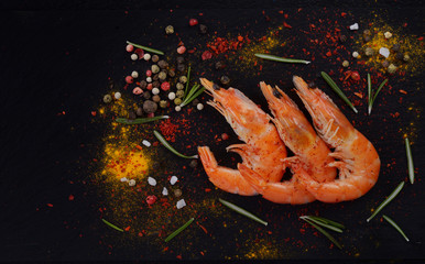 grilled shrimp on a black background