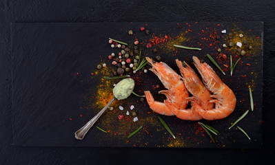 grilled shrimp on a black background