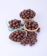 chocolate balls. chocolate balls in bowl on a background