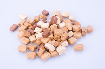 candies. caramel candies. caramel candies on a background. caramel candies on a background