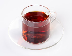 Tea in glass cup on a background. Tea in glass cup on a background