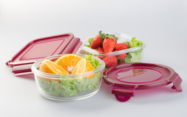 strawberry and orange on the background. strawberry and orange on the background