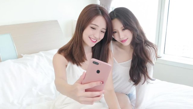 two beauty woman selfie happily