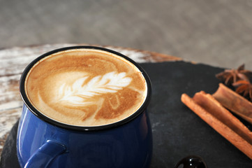 Morning Breakfast at cafe cappuccino in a mug of frothy milk
