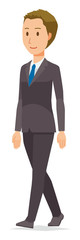 A young businessman is walking