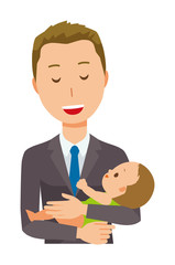 A young businessman is hugging a baby