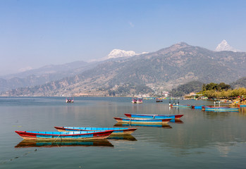 Fototapeta na wymiar rowbaots in Phewa lake in Pokhara in Nepal