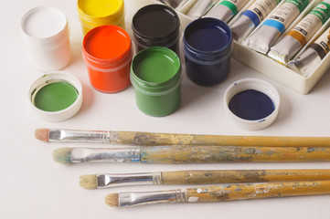 Old brushes on canvas, oil paints, gouache, a set for drawing