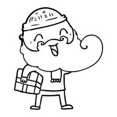 happy bearded man holding christmas present