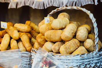 Traditional Polish smoked cheese on a Christmas market stand in Krakow, Poland.