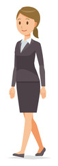 A business woman in a suit is walking