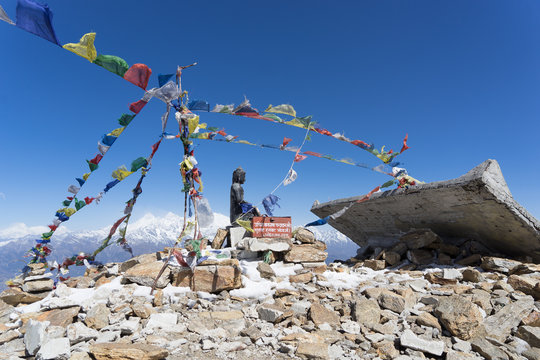 Buddha on mountain summit Nepal