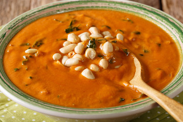 Homemade peanut cream soup close-up. horizontal