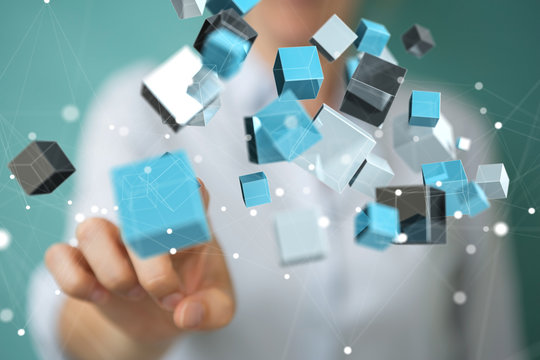 Businesswoman using floating blue shiny cube network 3D rendering