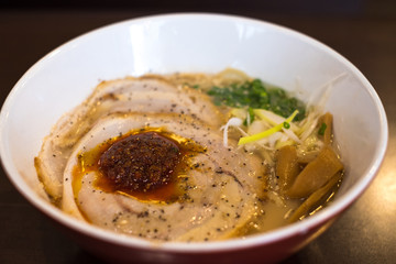 ramen on table japanese tonkotsu ramen, pork bone broth noodles