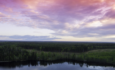 Fototapeta na wymiar Finnish countryside view in sunset 
