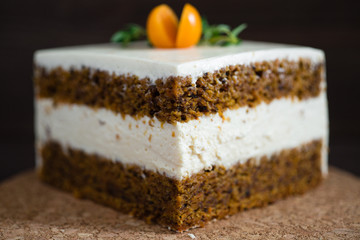 a piece of carrot cake with cream cheese | macro