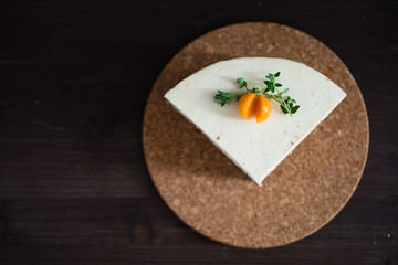 a piece of carrot cake with cream cheese | view from above