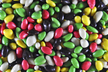 Texture of multi-colored dragee close-up