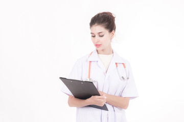 Professional medical career concept. Young female doctor with stethoscope, white cloth isolated in white. Holding a notepad.