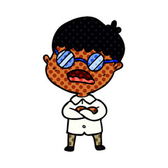 cartoon boy with crossed arms wearing spectacles