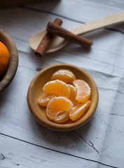 Ripe mandarine citrus . tangerine mandarine orange on wooden background. Mandarins in plate