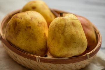 Fruit background. Fresh organic pears on old wood. Pear autumn harvest