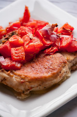 pork chop steak on the table close up