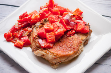 pork chop steak on the table close up