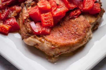 pork chop steak on the table close up