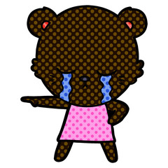 crying cartoon bear in dress pointing