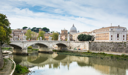 Obraz na płótnie Canvas View of Tiber river with St Peter's Basilica and Ponte Vittorio Emanuele II, Rome, Italy