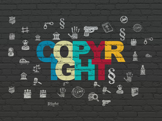 Law concept: Painted multicolor text Copyright on Black Brick wall background with  Hand Drawn Law Icons