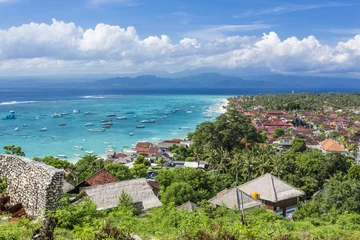 Fototapeten Bali Main town of Nusa Lembongan Island, Bali, Indonesia, with boats awaiting to go to mainland Bali  © IzzetNoyan