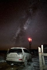 Fototapeta na wymiar SUV car under the stars