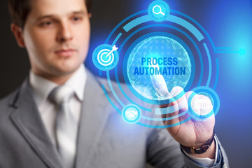 Business, Technology, Internet and network concept. Young businessman showing a word in a virtual...