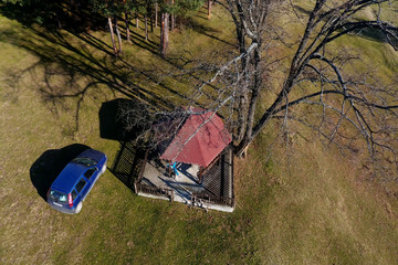 Aerial picture of car and resting place in forest