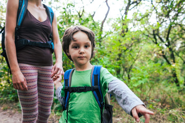 Fototapeta premium the child shows his mother a trail.