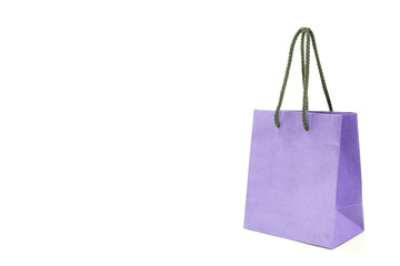 Mock up violet Paper Bag for shopping isolated on white.