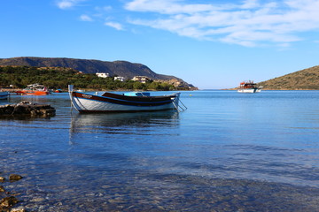 panoramic view of the boat on the clear water on the island of Crete, Greece