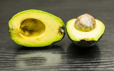 A cross-section of a ripe avocado.