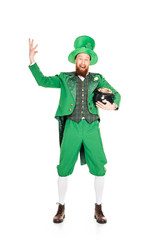 excited leprechaun gesturing and holding pot of gold, isolated on white