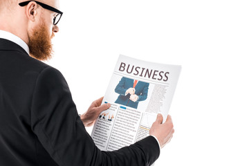 cropped shot of bearded businessman in eyeglasses reading newspaper isolated on white