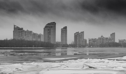 Winter city view, Obolon district, black and white frosty panorama, Kyiv, Ukraine