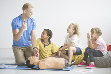 Paramedic and group of children