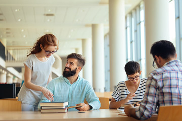 Group of college students studying